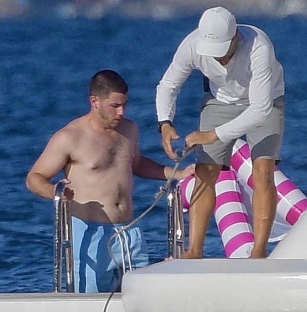 He then enlisted the help of a sailor to tie an inflatable boat to the yacht so that it would not float away.