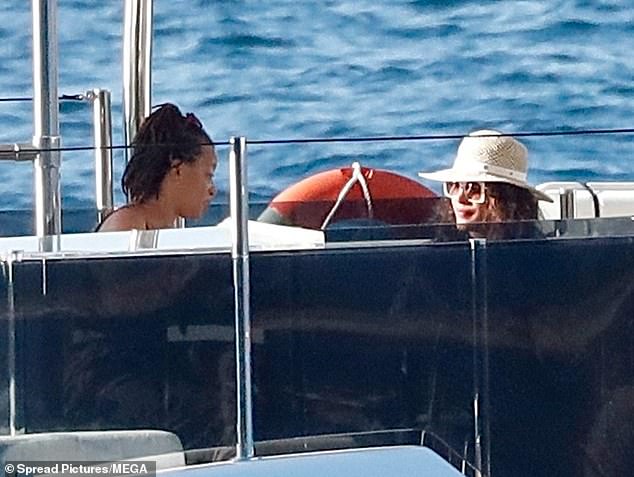 Later, Chopra donned a straw hat and was spotted chatting with a friend on the boat