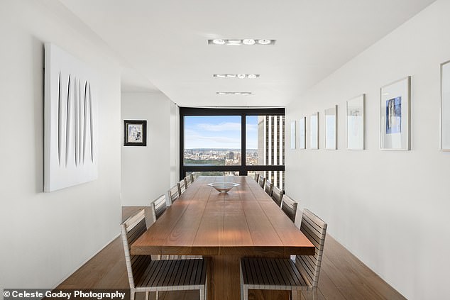 This long dining table can comfortably seat twelve people for dinner