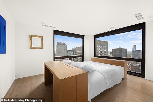 Another bedroom offers views of Midtown in two directions