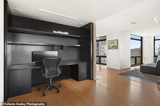 Built-in units have already been created that provide space for a home office