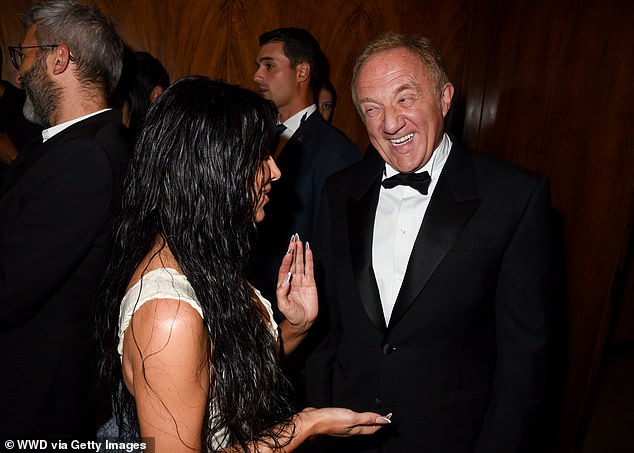 After being photographed with Salma Hayek, Kim was spotted chatting with the actress' husband, François-Henri Pinault, who is CEO of Kering