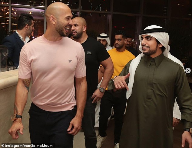 Sheikh Mana was spotted with notorious social media personality Andrew Tate (pictured, left)