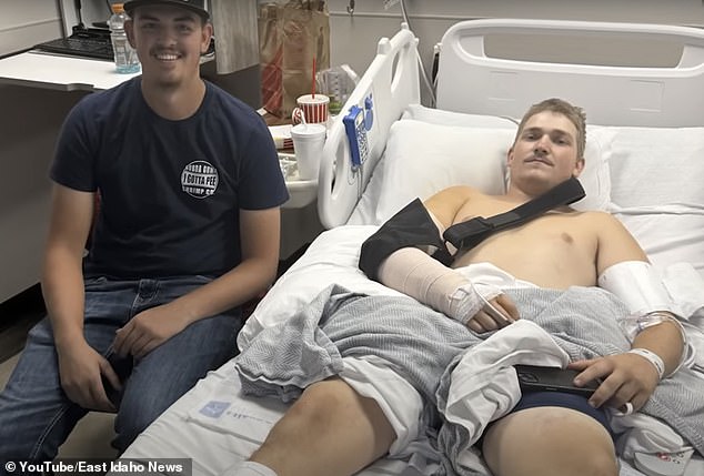 Riley Hill, 20, (right) was airlifted to Eastern Idaho Regional Medical Hospital, where he received 40 staples and numerous stitches. He has been released from the hospital, but doctors estimate it will take at least two months for his arm to heal. He is pictured with Braxton Meyers (left), who was with him during the attack