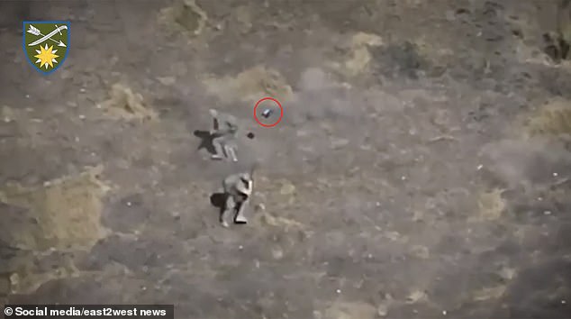 The small FPV drone was seen circling menacingly around the two soldiers, who both fired at it frantically.