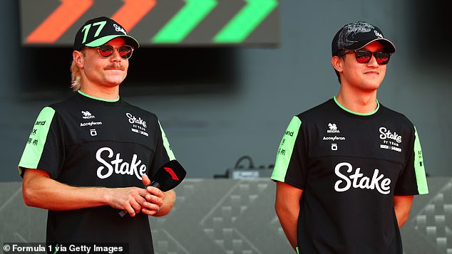 Zhou (right) and teammate Valtteri Bottas both battle for the final seat at Sauber