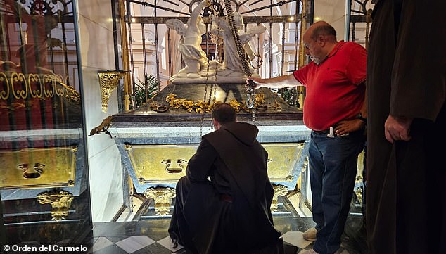 Saint Teresa of Avila died in 1582 and her body has remained largely unchanged since then. Pictured: The silver marble casket of Saint Teresa of Avila