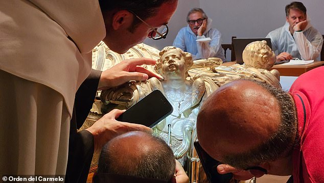 The team has not released any photos of St. Therese's remains, stating only that she has not changed since her body was last exhumed in 1914. Pictured: The silver marble casket of St. Therese of Avila