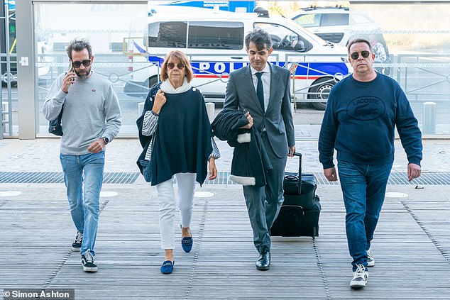 Gisele Pelicot arrives at court in Avignon, France, on Tuesday, supported by her children Fliran (left) and David (right)