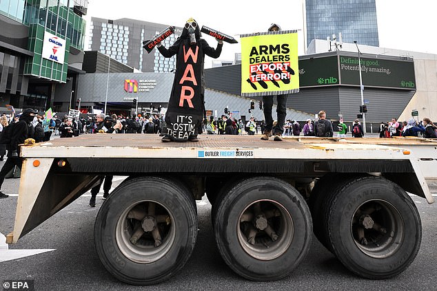 Pictured: Protesters arrive at the protest early Wednesday morning