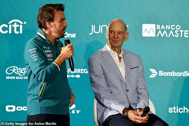 Former F1 world champion and current Aston Martin driver Fernando Alonso (left) attended Newey's unveiling