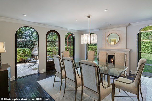 The living and dining room of the house have patio doors leading outside