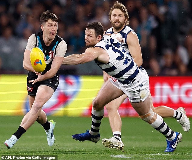 The Power midfielder (pictured left) was substituted at half-time last Thursday with a rib injury during the heavy qualifying final defeat to Geelong, with scans revealing bone bruising