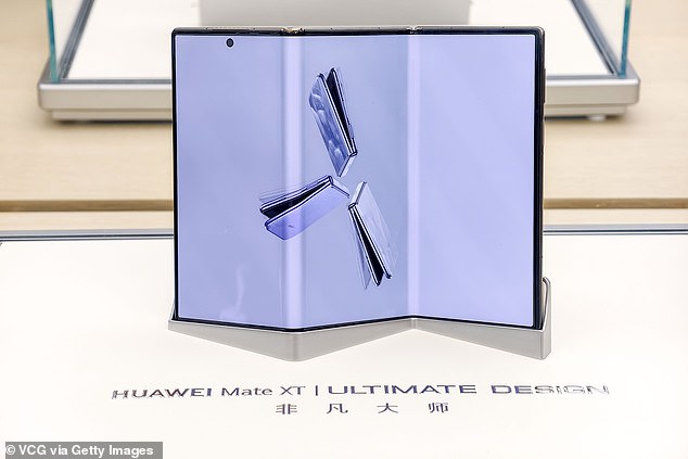 Huawei Mate XT Ultimate Edition, the world's first tri-foldable smartphone, seen here for sale at a Huawei flagship store on September 10, 2024 in Shanghai, China