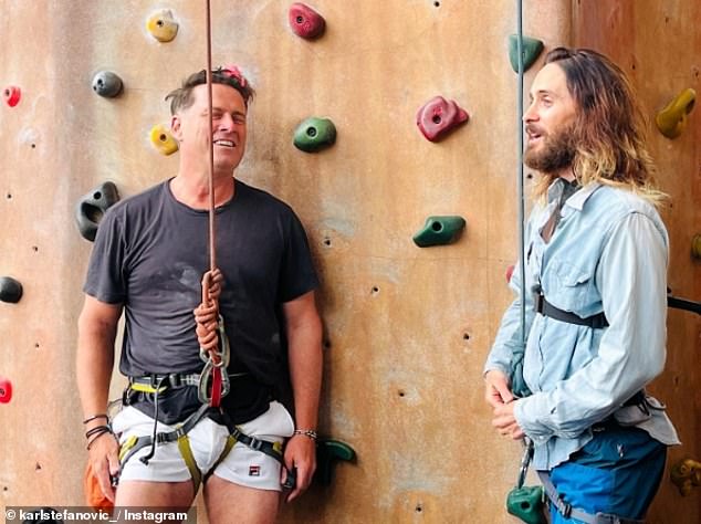 The Today host shared a very racy photo on Instagram in which he wore a harness that emphasized his shocking 'bump'. Pictured with Jared Leto