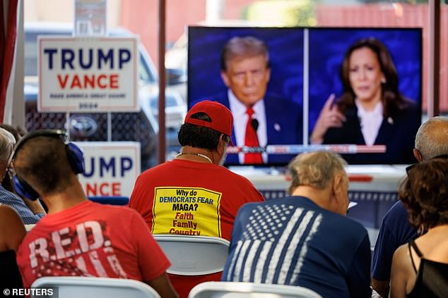 Members of the Escondido Republican Women watch the presidential debate between Democratic presidential candidate, U.S. Vice President Kamala Harris and Republican candidate, former U.S. President Donald Trump from their headquarters in Escondido, California