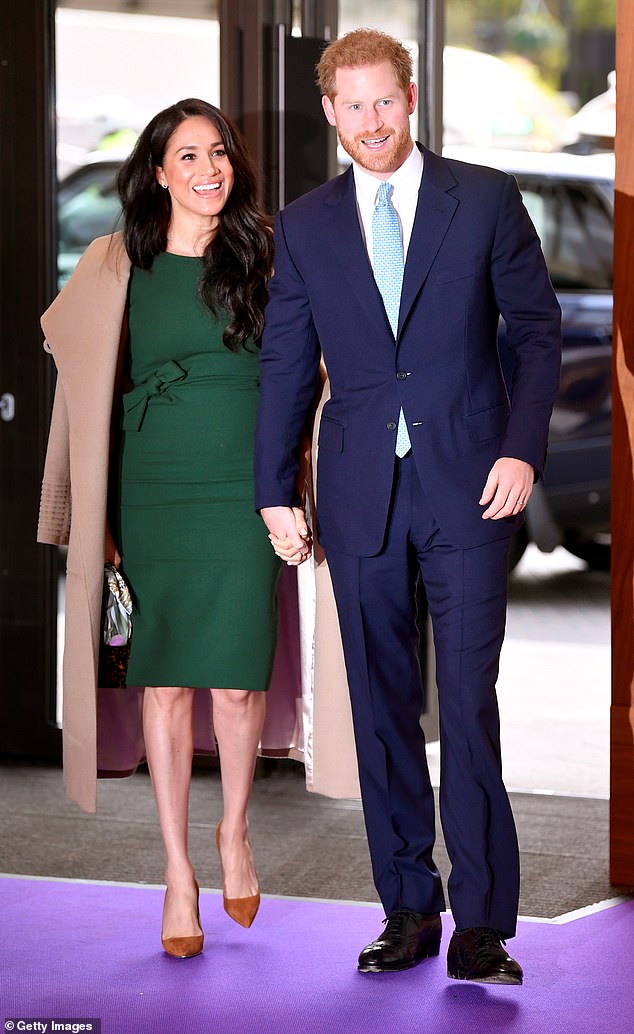 Speaking at the book event, Meghan Markle (pictured with Prince Harry in October 2019) said she 