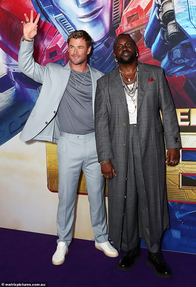 Later, Chris was all smiles as he posed for photos with co-stars ahead of the first Australian screening of the highly anticipated animated action film. Pictured with Brian Tyree Henry