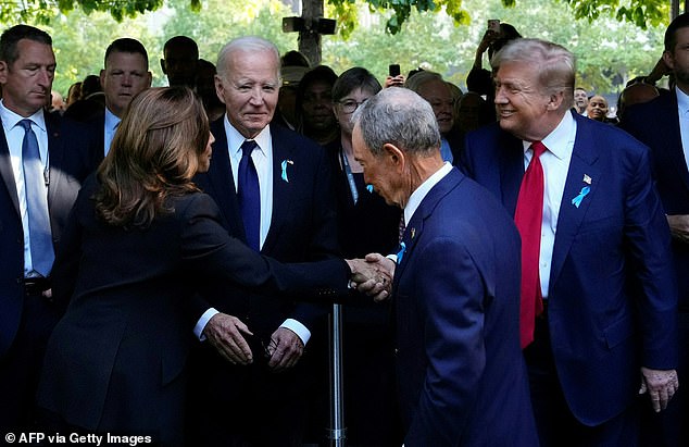 Vice President Kamala Harris (left) shakes hands with former President Donald Trump (right) as former New York Mayor Michael Bloomberg (center) and President Joe Biden (second from left) look on