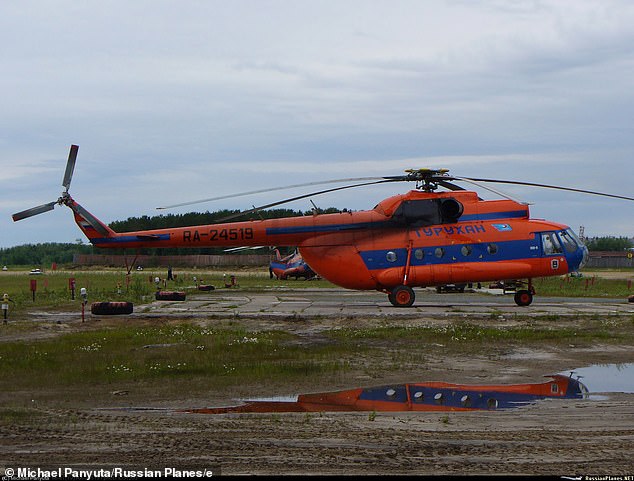 Russian law enforcement alleges that Timur, 13, and Sasha, 14, were behind the sabotage, which left the Mi-8T helicopter (pictured) 'almost completely destroyed'