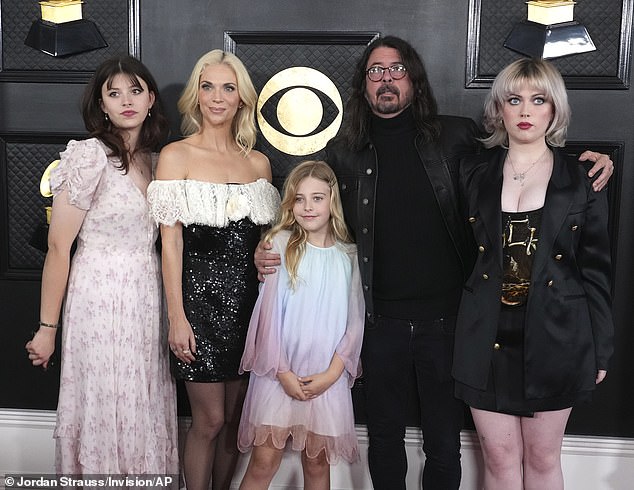 The couple have three daughters: Violet, Harper and Ophelia (pictured at the 2023 Grammy Awards)