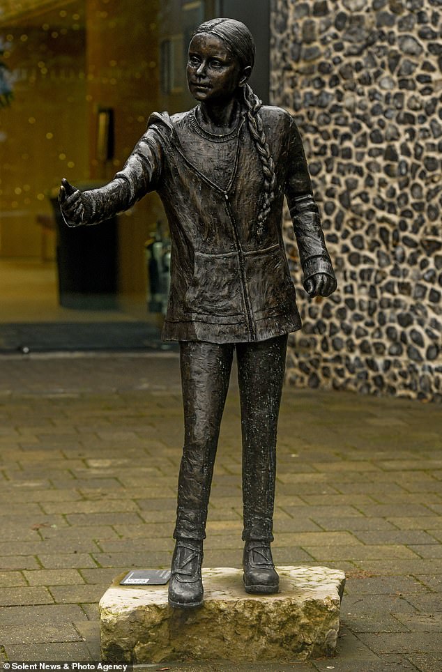 The University of Winchester has moved a life-size statue of Greta Thunberg from its main entrance to a secluded spot after angry students criticised the £24,000 expenditure as a waste of money (the statue is pictured before it was moved)