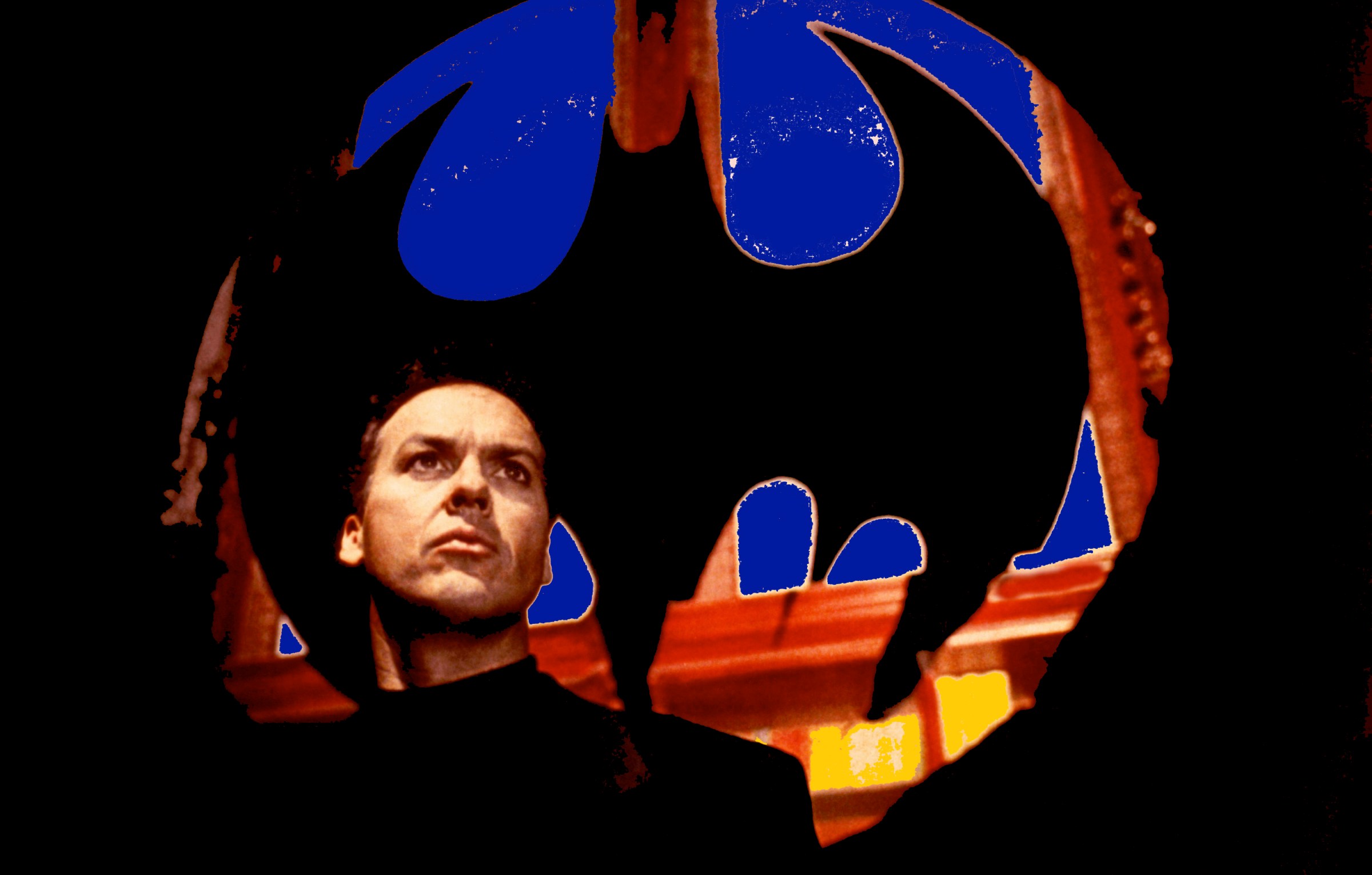 Bruce Wayne (Michael Keaton) stands under a giant Batman symbol in Tim Burton's 1989 Batman