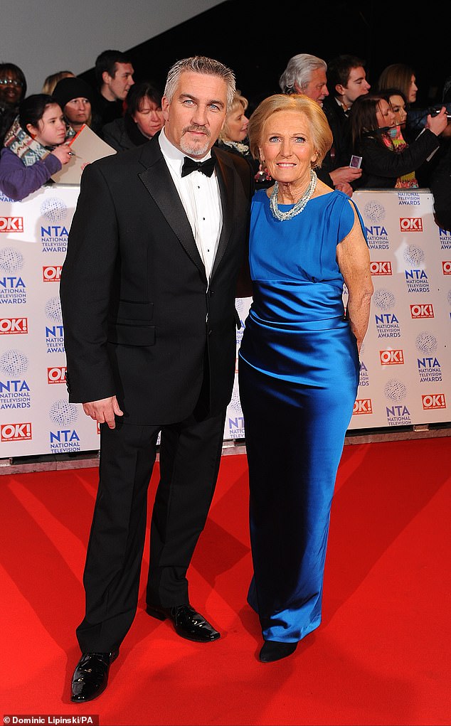 The 89-year-old Great British Bake Off star wore a stunning blue satin number, which she first wore at the annual awards ceremony in 2013 (pictured)