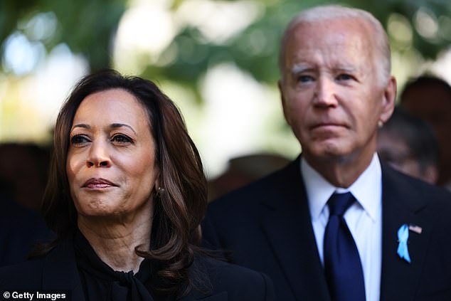 Kamala Harris looks on during the memorial ceremony at Ground Zero, with Biden in the background, the day after her debate with Trump