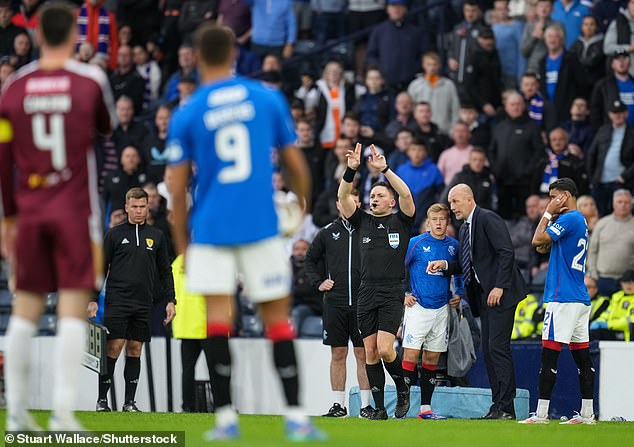 However, the referee awards the goal to Rangers, much to the dismay of St Johnstone