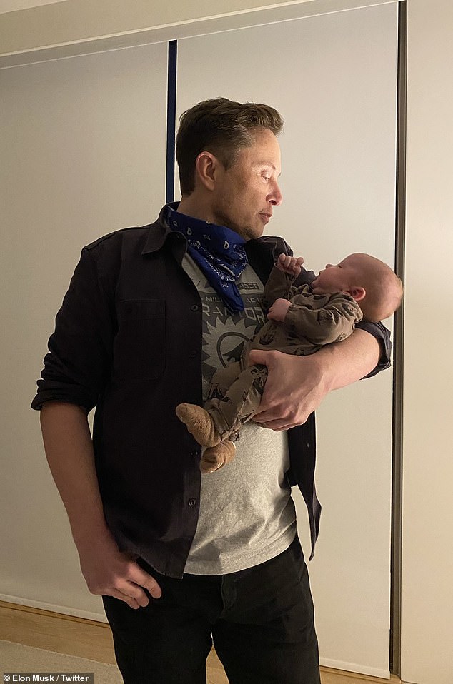 Musk began dating singer Grimes in May 2018 and she gave birth to their son X AE A-Xii, pictured here, in May 2020