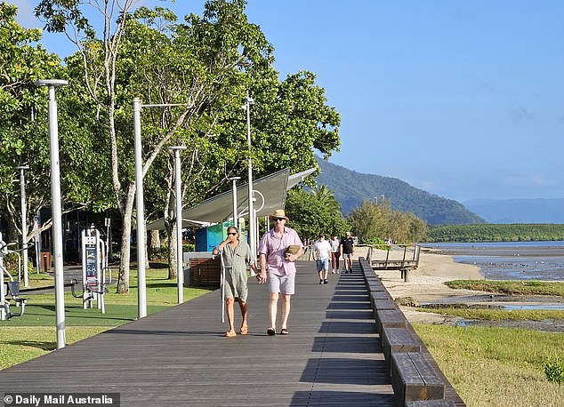 The Australian Olympic gold medalist, 51, went for a walk along the waterfront with an unknown man in what appeared to be a romantic outing for the couple