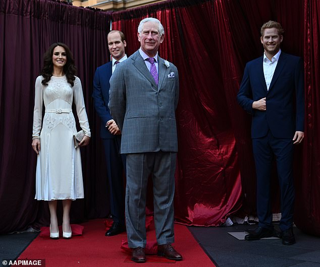 The Prince and Princess of Wales stand next to King Charles while Prince Harry smiles on the corner. A set of royal wax figures unveiled at Madame Tussauds in Sydney