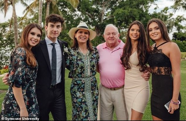 Brazilian toy magnate Leo Kryss, pictured with his family, claims that real estate agent Douglas Elliman flatly denied that Bezos was behind the purchase when he raised his suspicions