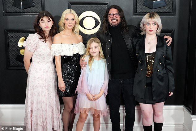 The Grohls last year before Dave's shocking confession. From left: Harper, Jordyn, Dave, Ophelia and Violet at the Grammys in Los Angeles, California.