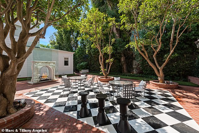 The home also features a life-size chess board in the backyard