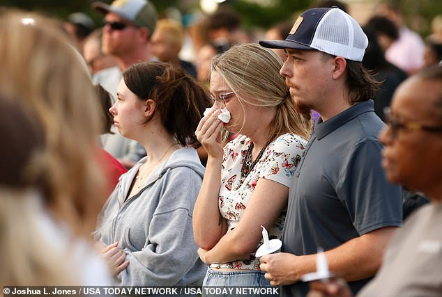 Relatives gather at a vigil on the night of the shooting at Apalachee High School in Winder, Georgia