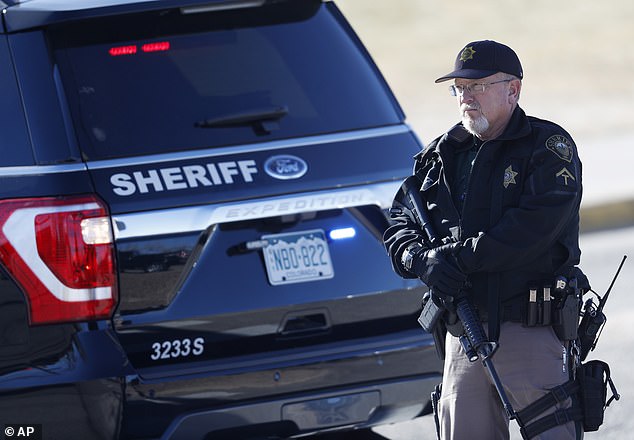 Officers said they were able to recover the firearm used in the shooting from Metz's truck. A member of the department is seen here during a 2018 incident