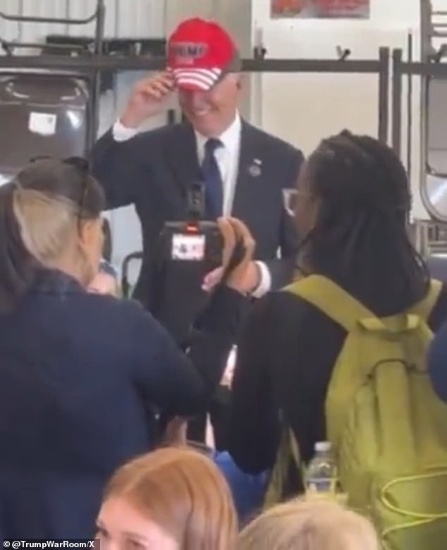 Another angle of the video shows the 81-year-old commander in chief wearing his signature red hat as a gesture of 