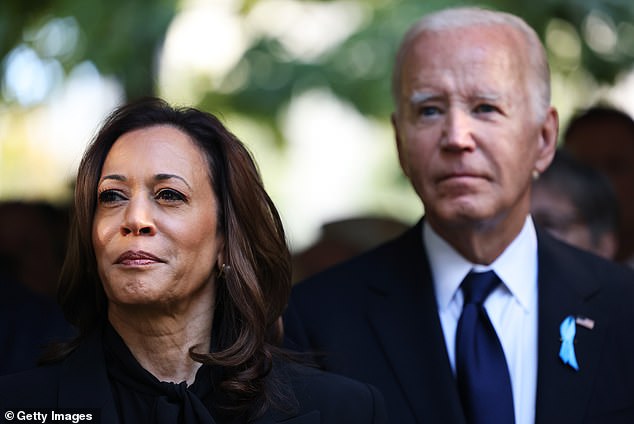 Kamala Harris looks on during the memorial ceremony at Ground Zero, with Biden in the background, the day after her debate with Trump