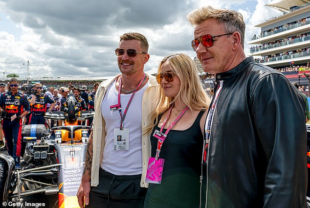 Adam, Holly and Gordon pictured together at the British Grand Prix at Silverstone last year