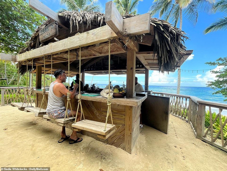 The Casamigos beach bar, complete with swings for bar stools, is one of many on site