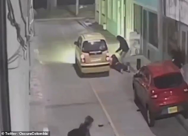 Security camera in Bogotá, Colombia, captured the killer leaning over the singer and continuing to shoot before fleeing