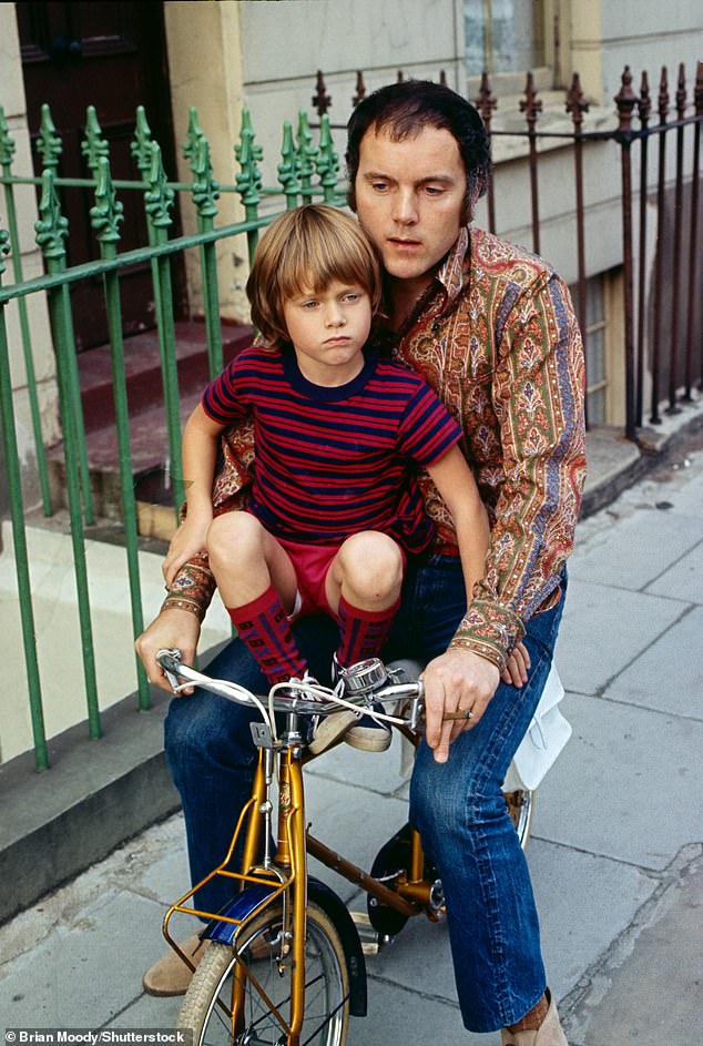 Cope is survived by his loving wife Renny Lister and his children Nick, Mark and Martha (pictured with one of his sons in 1969)