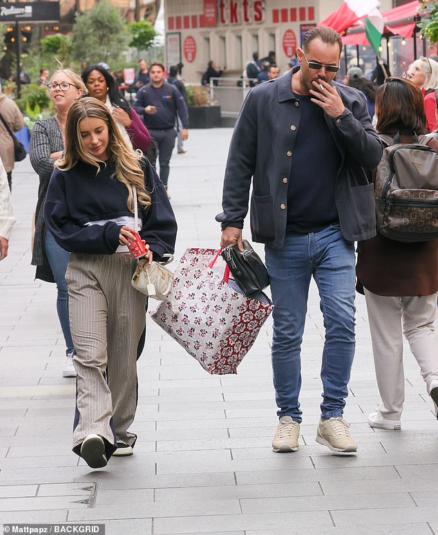 The former EastEnders star, 47, looked casual during the outing as he wore a navy shirt teamed with a dark grey jacket