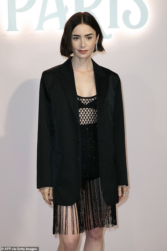 The 35-year-old actress stunned in a 1920s-inspired little black dress which she paired with an oversized black blazer