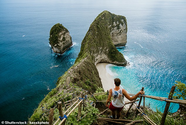 But few tourists actually reach the pristine white sands of the Indonesian idyll of Nusa Penida, a short boat ride from Bali, as the beach can only be reached via a gruelling 30-minute descent down hundreds of rickety steps carved into the steep hillside.