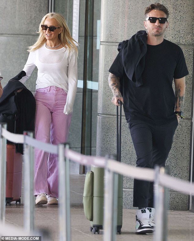 Gold Logie winner Carrie, 43, and comedian Tommy, 39, were all smiles as they arrived in Sydney on August 27 for a business trip from Melbourne