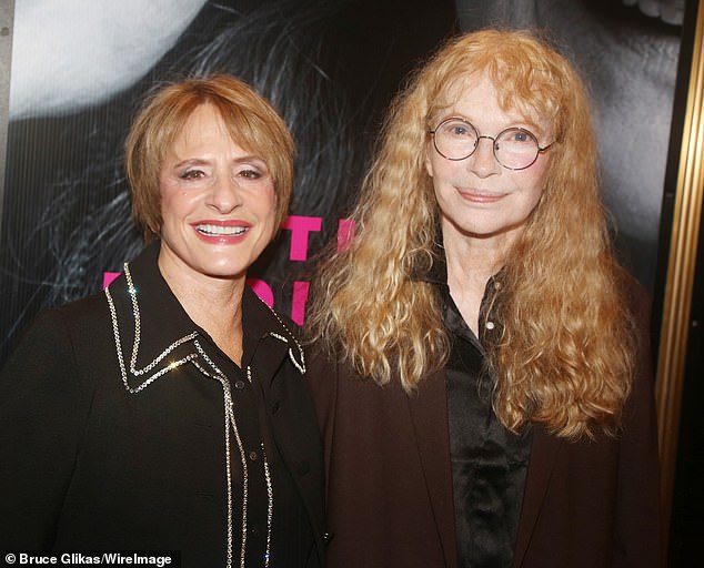 LuPone opted for a long black coat with silver sequins, matching black pants and black pumps.