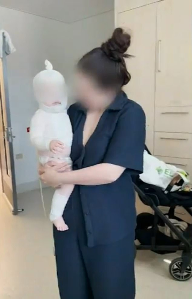 The nine-month-old baby (pictured with his mother) suffered severe burns to his face, upper body and arms and has undergone more than five operations at Queensland Children's Hospital. He faces multiple further operations and a life of permanent disfigurement